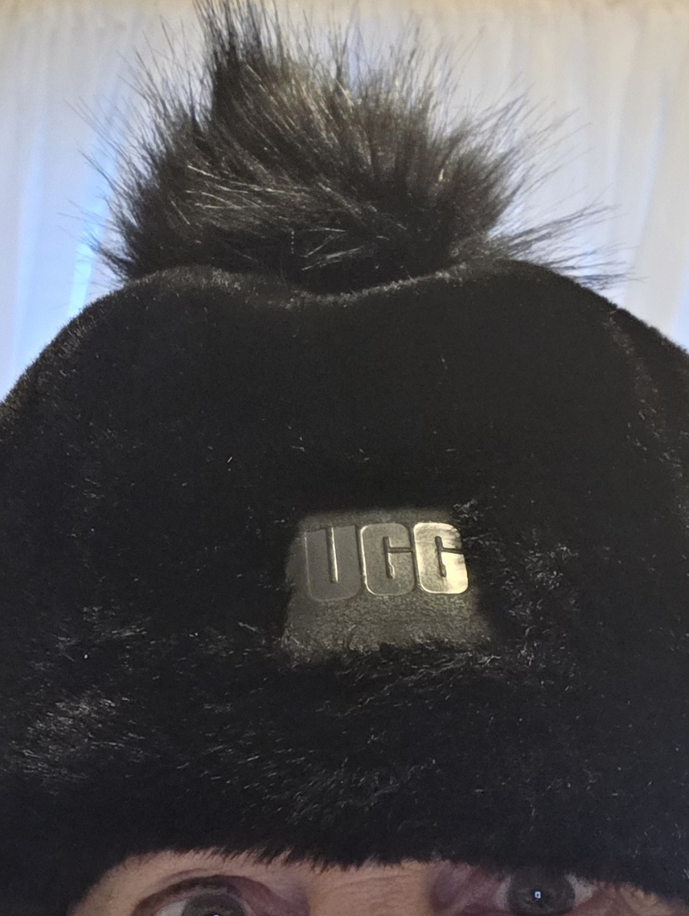UGG Black Faux Fur Pom Beanie Hat with Metallic Logo NWOT